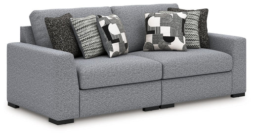 Benchcraft Bealton stationary sectional sofa with plush fabric upholstery and multiple seating sections in a modern living room