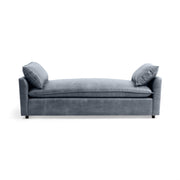 Classic Home Caplan backless sofa daybed with plush cushions and sleek wooden legs, ideal for modern living spaces.