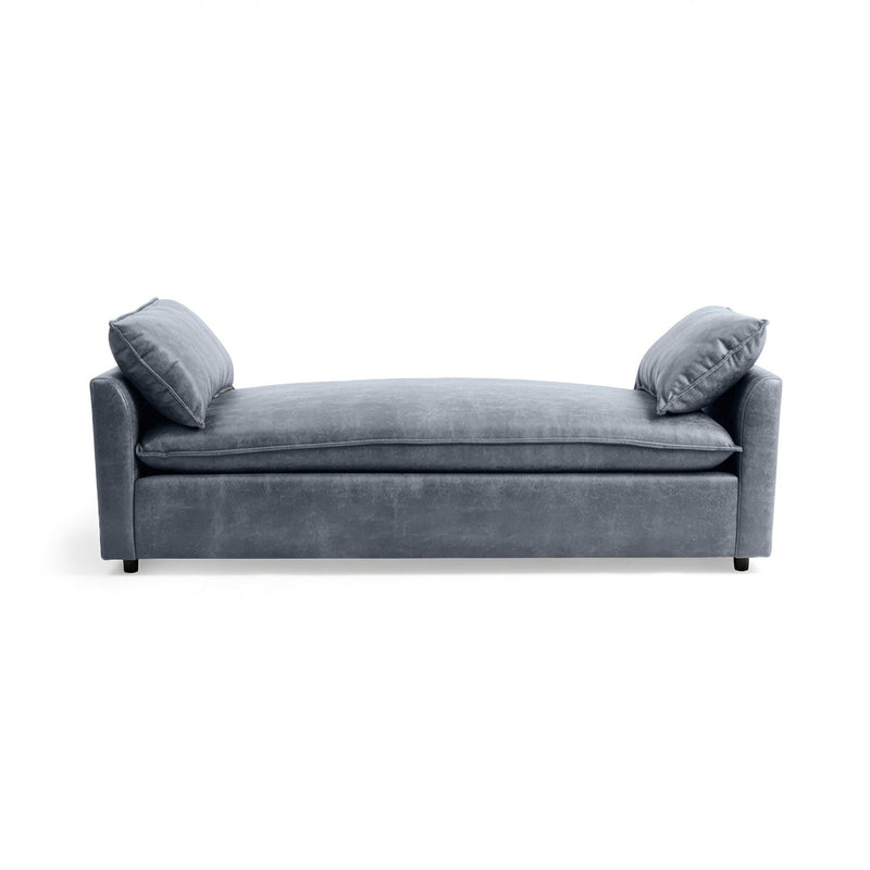 Classic Home Caplan backless sofa daybed with plush cushions and sleek wooden legs, ideal for modern living spaces.