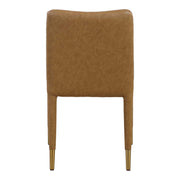 Pair of Uttermost Conifer dining chairs set, featuring elegant wood frames and upholstered seats for stylish dining room decor.