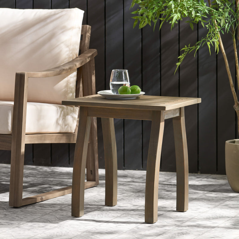 Noble House Kinesis outdoor side table with slatted top and wooden frame, perfect for patio or garden seating areas.