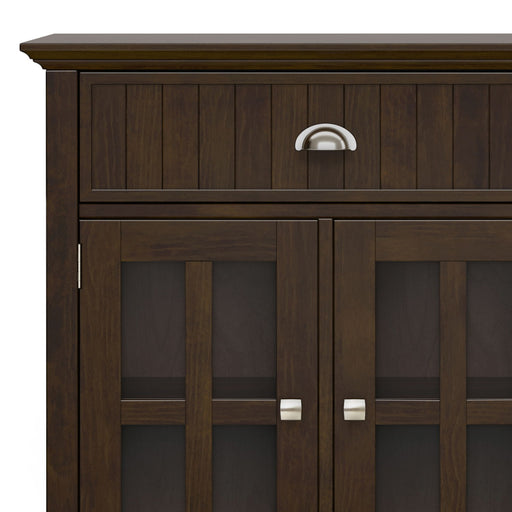 Large brown Acadian sideboard buffet by Simpli-Home with multiple storage compartments and a sleek wooden finish.
