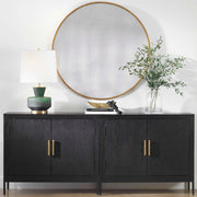 Round wall mirror by Uttermost featuring a sleek frame, ideal for modern home decor.