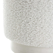 Uttermost Avila accent ottoman with plush fabric and wooden legs, versatile piece for living room or bedroom decor.