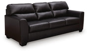 Midnight Queen Sofa Sleeper by Signature Design Ashley featuring plush fabric, plush cushions, and a fold-out sleeper bed in a modern style.