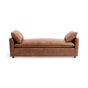 Classic Home Caplan backless sofa daybed with tufted upholstery and wooden legs, showcasing a modern, stylish design.