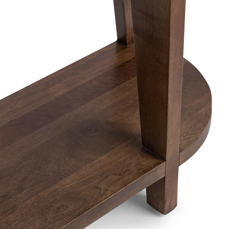 Alenna round coffee table by Classic Home featuring a smooth wooden surface and modern design for living rooms.