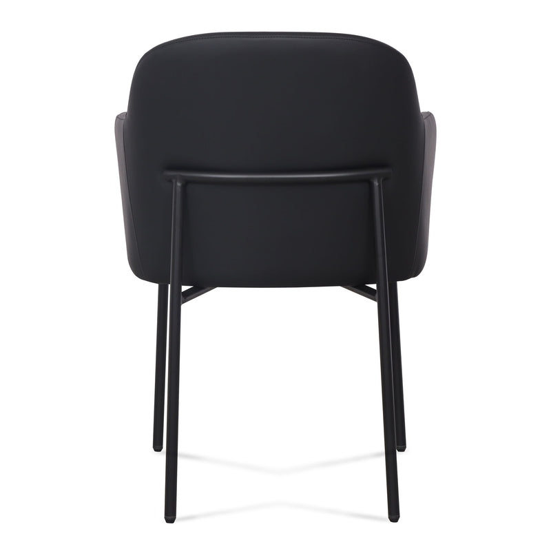 Pair of TOV Furniture Sydney armchairs in a modern design, featuring plush upholstery and sleek wooden legs.