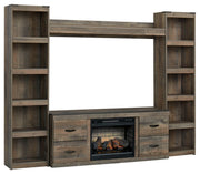 Trinell - 4-Piece Entertainment Center With 60" TV Stand - R&R Furniture Gallery (Fountain Valley, CA)