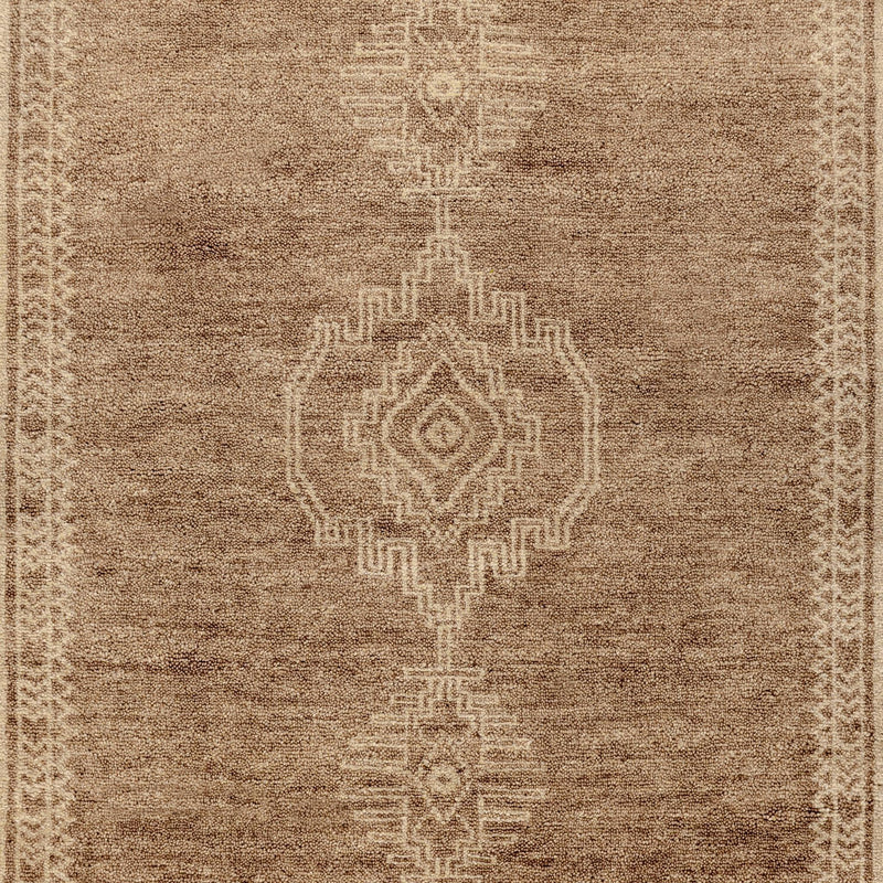 Hand-knotted Cairo area rug by Classic Home featuring intricate traditional patterns in rich colors.