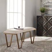White geometric accent bench by Uttermost, showcasing a modern design with angular lines and sturdy construction.
