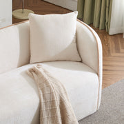 Noble House Coral 3-seater curved stationary sofa with plush cushions and modern design in a stylish living room setting.