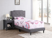 Button tufted upholstered bed by Glory Furniture with a plush, cozy design perfect for comfortable bedroom spaces.