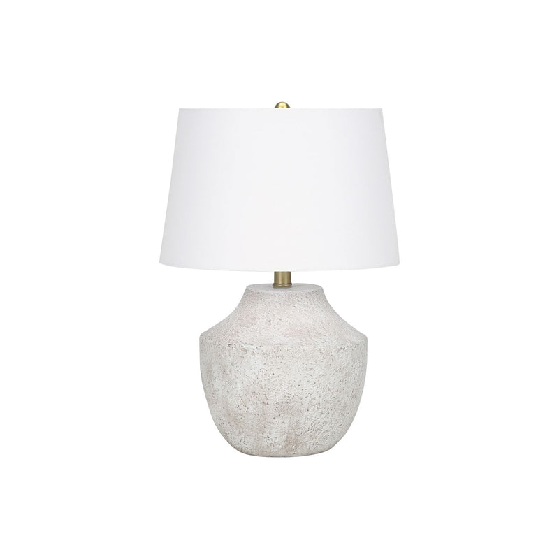 Modern concrete table lamp in cream color by 8th Street, showcasing a sleek, minimalist design with a smooth surface.