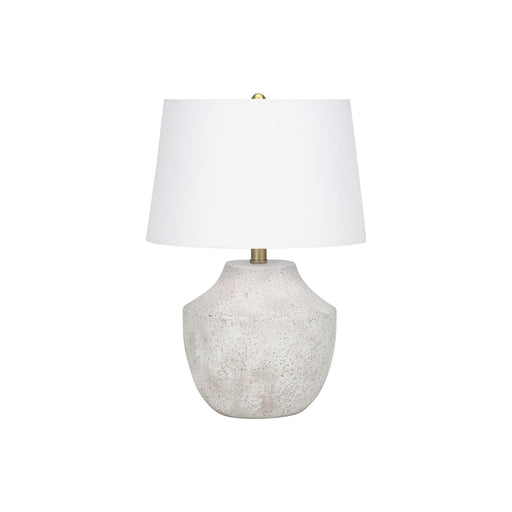 Modern concrete table lamp in cream color by 8th Street, showcasing a sleek, minimalist design with a smooth surface.