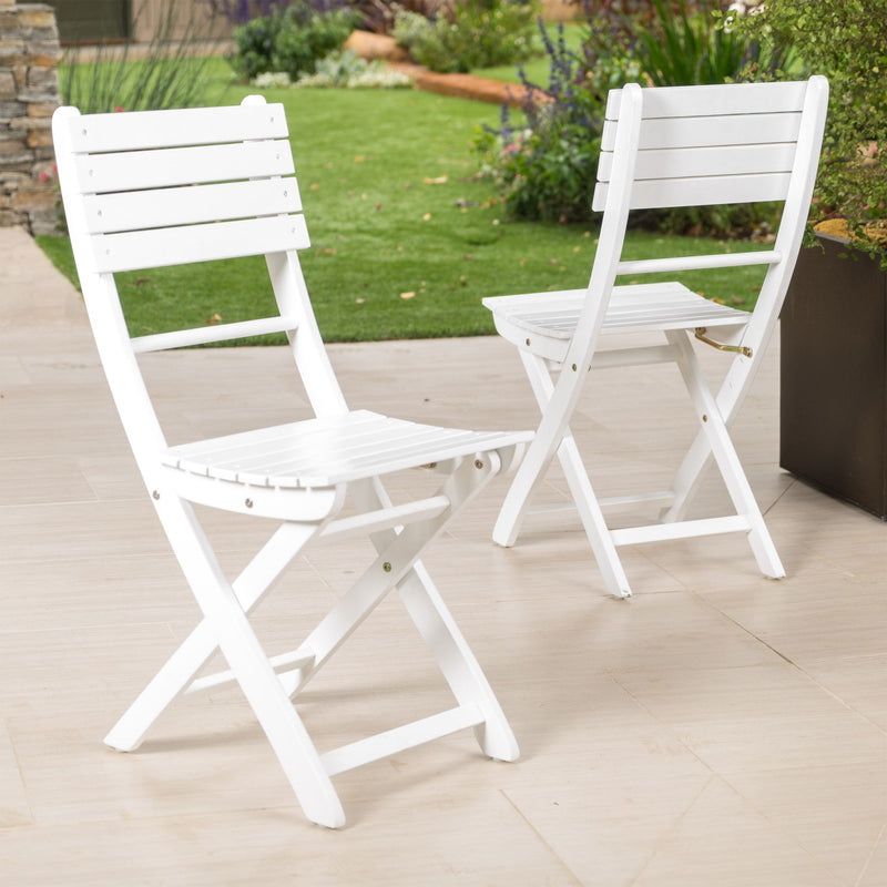 Set of two Noble House outdoor foldable wood dining chairs with slat design, perfect for patio or garden seating.