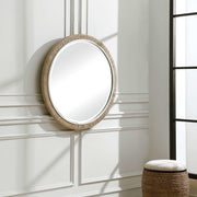 Light brown round rope wall mirror by Uttermost, featuring a stylish rope frame and reflective glass surface.