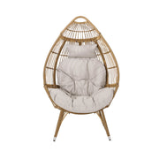 Noble House teardrop-shaped basket accent chair with water-resistant cushion in natural finish, stylish and comfortable for indoor or outdoor use.