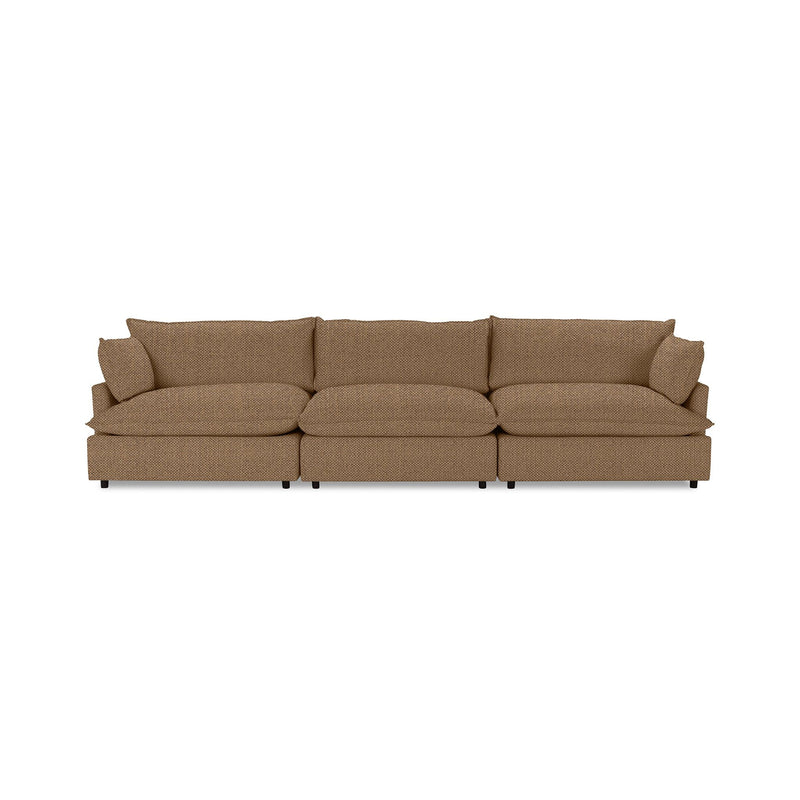Classic Home Caplan modular sectional sofa with plush cushions and fabric upholstery, shown in a modern living room setting.