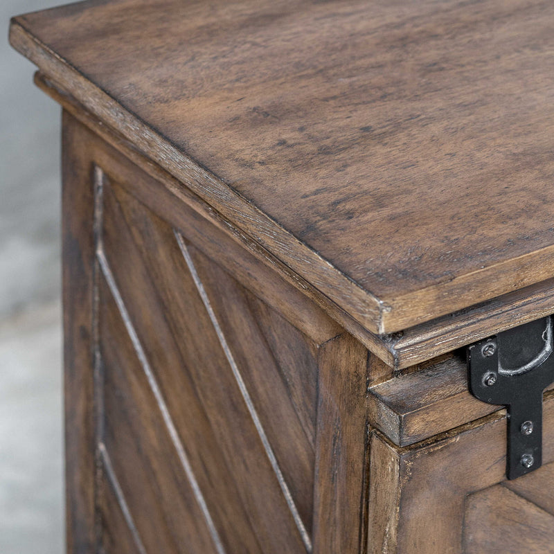 Uttermost Primalia barn door media console in light brown wood with sliding barn doors and storage compartments.
