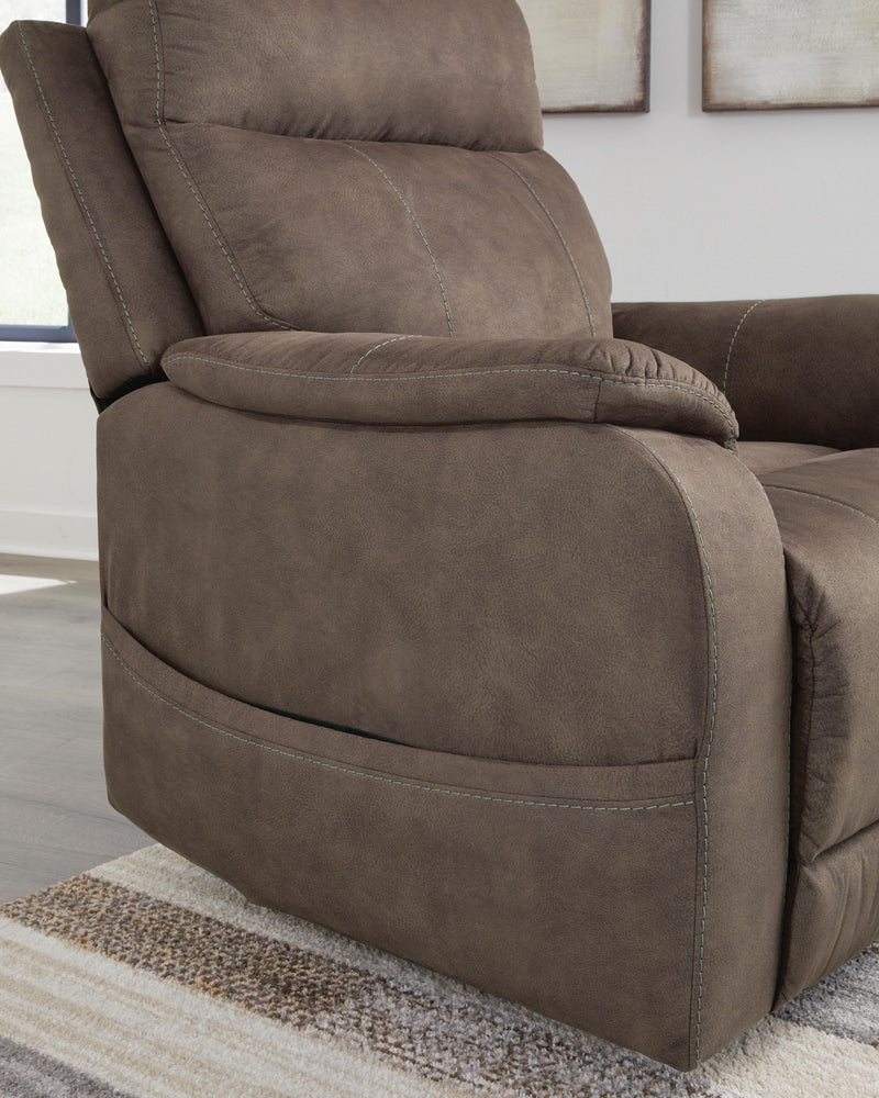 Crestmeade Power Lift Recliner by Signature Design Ashley, showcasing plush upholstery and adjustable reclining features.