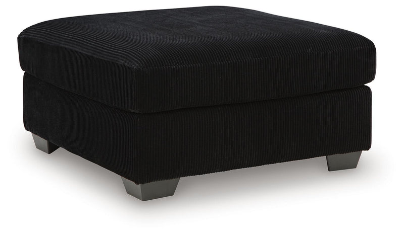Signature Design by Ashley SimpleJoy oversized accent ottoman with plush fabric and modern design, ideal for living room decor.