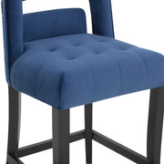 Hart velvet bar height stool by TOV Furniture with a sleek design and plush velvet upholstery, 28-30 inches tall.