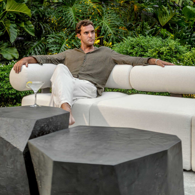 Uttermost Parra outdoor coffee table with a sleek, modern design featuring a metal frame and glass top.