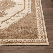Hand-knotted Luxor area rug by Classic Home featuring intricate patterns and rich colors for elegant room decor.