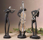 Set of three black musician decorative figurines by Uttermost, elegant sculptures depicting musicians in artistic poses.