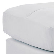 Upholstered casual ottoman by Glory Furniture with a soft fabric cushion, ideal for stylish living room or lounge spaces.