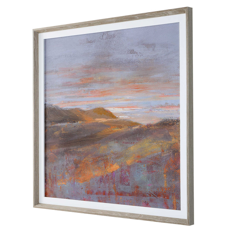 Uttermost framed print "Dawn On The Hills" featuring purple tones, landscape scene with a decorative frame.
