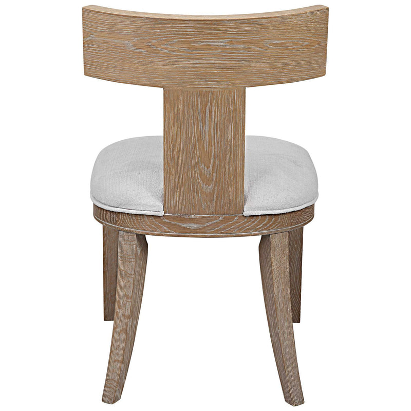 Uttermost Idris armless side chair with upholstered seat and wooden legs, modern design for living or dining rooms