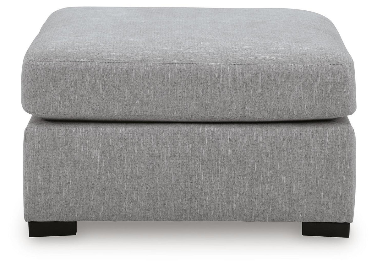 Benchcraft Lakepoint oversized accent ottoman in nickel finish, showing a plush cushioned top and modern design.