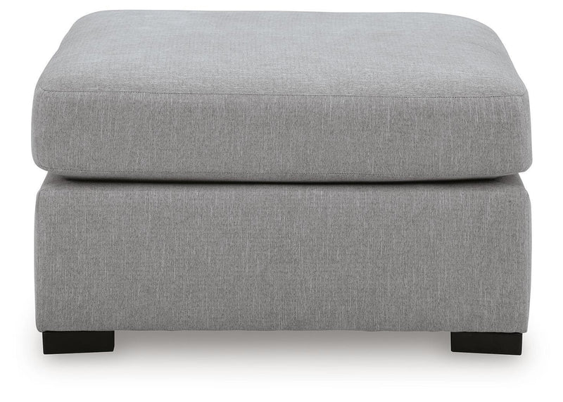 Benchcraft Lakepoint oversized accent ottoman in nickel finish, showing a plush cushioned top and modern design.