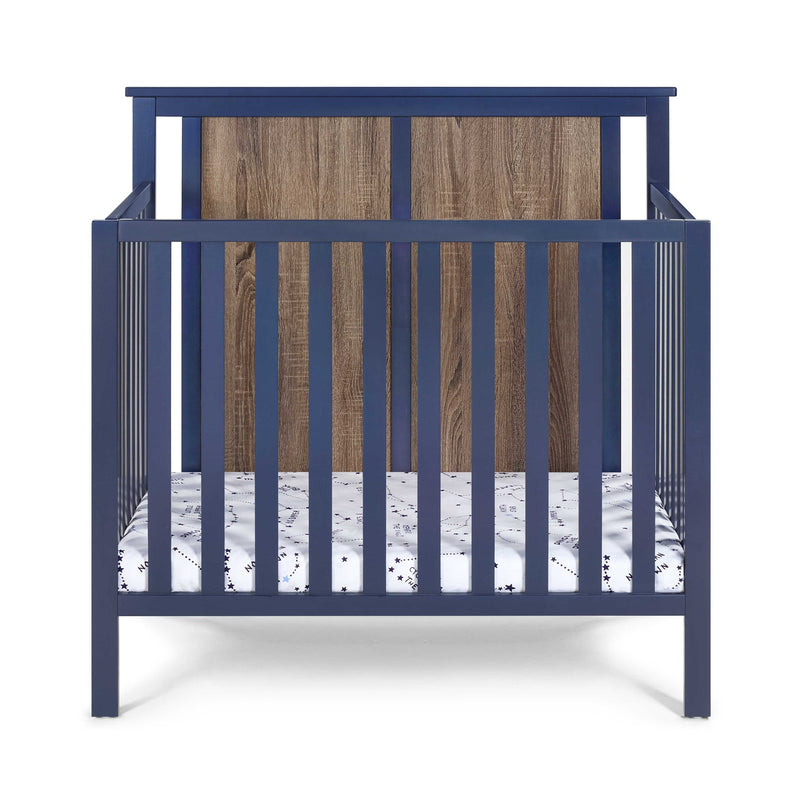 Connelly - Mini Crib With Mattress Pad - R&R Furniture Gallery (Fountain Valley, CA)