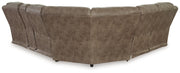 Signature Design by Ashley Ravenel 3-piece power reclining sectional with faux leather, featuring a reclining loveseat with console in fossil color
