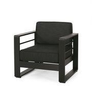 Noble House Maya Bay club arm chair with beige upholstery and wooden legs, stylish and comfortable seating for living rooms.