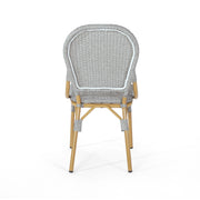Set of two Noble House outdoor rattan and aluminum armless French bistro chairs in dark gray, perfect for patio or garden seating.