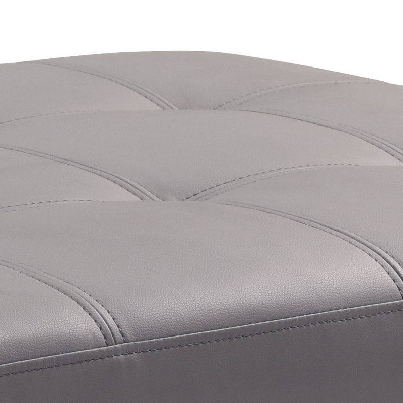 Upholstered contemporary ottoman for living rooms by Glory Furniture, featuring a plush fabric surface and modern design.