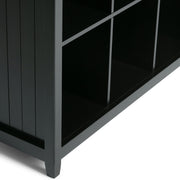 Handcrafted Acadian cube storage organizer by Simpli-Home with multiple compartments for versatile storage.