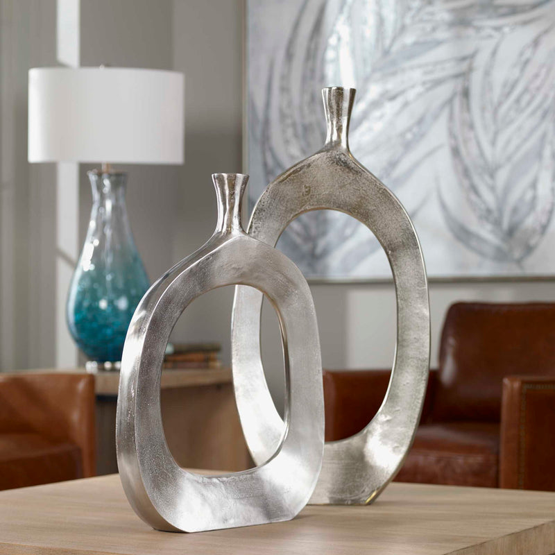 Set of two Pearl Silver aluminum vases from Uttermost, featuring sleek, modern design perfect for home decor.