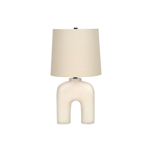 Modern cream resin table lamp by 8th Street with a sleek design, perfect for contemporary home lighting.
