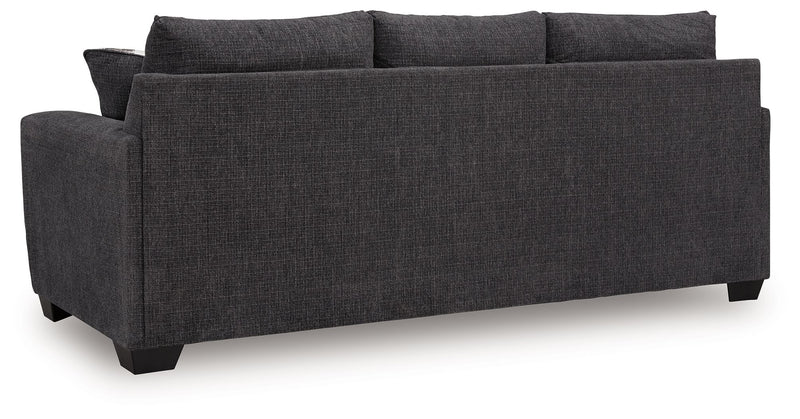 Benchcraft Loreo sofa sleeper with plush fabric, modern design, and convertible seating shown in a stylish living room setting.