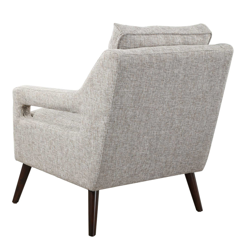 Uttermost O'Brien armchair with plush fabric upholstery and sleek wooden legs, showcasing a modern and comfortable design.