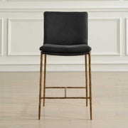 Uttermost Ascend counter stool with wooden seat and metal frame, 24-27 inch height, modern design for kitchen or bar area.