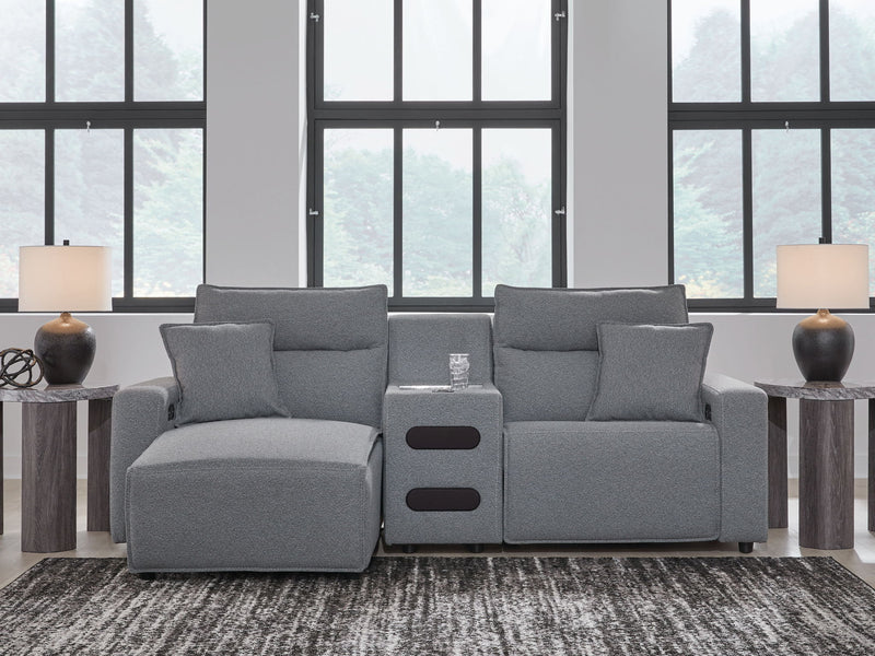 Signature Design by Ashley Modmax II reclining sectional in salt and pepper fabric, showing plush cushions and reclining features.