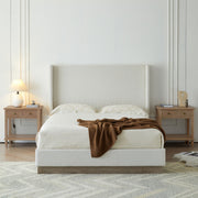 House & Home Furniture Hale upholstered wingback bed with cushioned headboard and fabric upholstery, shown in a modern bedroom setting.