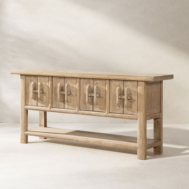 Jennifer Taylor Home Rowan sideboard with natural wood finish and lower shelf, showcasing a sleek modern storage solution.
