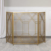 Uttermost Rosen gold fireplace screen with ornate metal design, decorative and functional fireplace safety accessory.